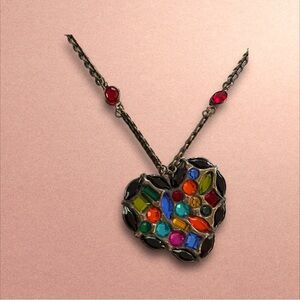 This vintage heart necklace is gorgeous not sure of the maker.